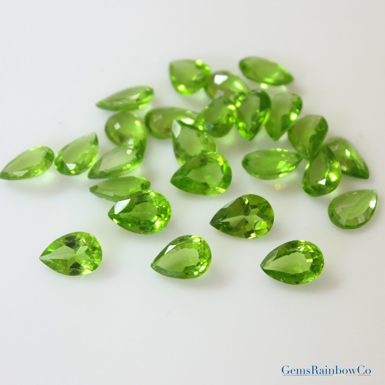 Peridot 9x6, 9x7, 10x7, and 12x7 mm Green Pear | GemsRainbowCo